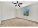 Clean and spacious bedroom with large window offering natural light at 1600 N Saba St # 214, Chandler, AZ 85225