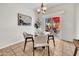 Bright dining area with sliding doors to an outdoor patio at 1600 N Saba St # 214, Chandler, AZ 85225