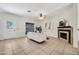 Inviting living room with tiled floors, fireplace, and neutral decor at 1600 N Saba St # 214, Chandler, AZ 85225