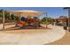 Community playground with shade structures and climbing equipment at 17038 W Mohave St, Goodyear, AZ 85338