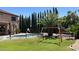 Lush backyard featuring a swing set, perfect for outdoor fun and relaxation at 17658 N 52Nd Pl, Scottsdale, AZ 85254