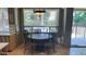 Cozy dining area with a round table and chairs, illuminated by a decorative chandelier at 17658 N 52Nd Pl, Scottsdale, AZ 85254
