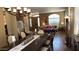 Dining room with a large table, neutral color walls, and natural lighting at 17658 N 52Nd Pl, Scottsdale, AZ 85254