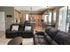 Open-concept living room showcasing seamless flow to the kitchen and dining area at 17658 N 52Nd Pl, Scottsdale, AZ 85254