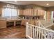 Spacious loft with custom cabinets and a built-in desk area, perfect for a home office at 17658 N 52Nd Pl, Scottsdale, AZ 85254