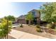 Two-story stucco home featuring a two-car garage, low maintenance landscaping, and covered entryway at 17946 W Via Del Sol --, Surprise, AZ 85387