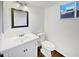 Bathroom with vanity, modern mirror, and toilet at 1901 E Hearn Rd, Phoenix, AZ 85022