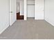 Comfortable bedroom features neutral carpeting and ample closet space at 1901 E Hearn Rd, Phoenix, AZ 85022