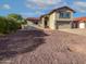 Charming two-story home with a well-maintained front yard and attached two-car garage at 1901 E Hearn Rd, Phoenix, AZ 85022
