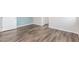 Bedroom showcasing durable wood-look flooring and neutral wall colors at 19318 E Reins Rd, Queen Creek, AZ 85142