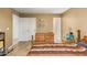 Bedroom with wood floors, storage, and neutral paint at 1951 E Del Sur Dr, Tempe, AZ 85283