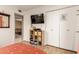Bedroom featuring a large closet, wood-look flooring, and a wall-mounted television at 1951 E Del Sur Dr, Tempe, AZ 85283