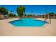 Relaxing community pool area featuring a large pool with well maintained surroundings at 1951 E Del Sur Dr, Tempe, AZ 85283
