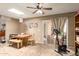 Bright dining area with tile floors, casual wooden table and access to patio through sliding glass door at 1951 E Del Sur Dr, Tempe, AZ 85283