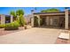 Attractive home with desert landscaping and a covered carport, offering convenience and curb appeal at 1951 E Del Sur Dr, Tempe, AZ 85283