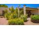 Inviting desert landscaping with a covered car port entrance and a welcoming front door at 1951 E Del Sur Dr, Tempe, AZ 85283