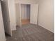 Bedroom featuring plush carpet flooring and white trim at 1970 W Park Pl, Chandler, AZ 85224