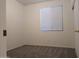 Cozy bedroom with plush carpeting, white walls and a large window at 1970 W Park Pl, Chandler, AZ 85224