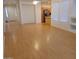 Spacious open-concept living room showcasing wood floors, and great natural light at 1970 W Park Pl, Chandler, AZ 85224
