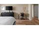Comfortable main bedroom with a ceiling fan, natural light, and neutral color palette at 19700 N 76Th St # 1038, Scottsdale, AZ 85255