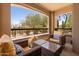 Relaxing outdoor patio seating offers serene views of the desert landscape at 19700 N 76Th St # 1038, Scottsdale, AZ 85255