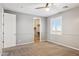 Bedroom with window, carpet and walk-in closet at 20226 N Madison Dr, Maricopa, AZ 85138