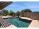 Private backyard with pool and patio space at 20226 N Madison Dr, Maricopa, AZ 85138