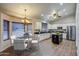 Bright kitchen with dining nook, stainless steel appliances, and ample storage space at 20911 E Excelsior Ave, Queen Creek, AZ 85142