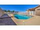 Sparkling pool with deck and mountain views at 20911 E Excelsior Ave, Queen Creek, AZ 85142