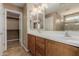 Bathroom featuring double sinks and large mirror at 21136 N 36Th Pl, Phoenix, AZ 85050