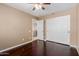 Bedroom with hardwood floors features sliding door closet at 21136 N 36Th Pl, Phoenix, AZ 85050
