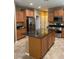 Well-equipped kitchen with stainless steel appliances, a kitchen island, and ample counter space at 21136 N 36Th Pl, Phoenix, AZ 85050