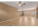 Open-concept living room with chandelier and tile flooring at 21136 N 36Th Pl, Phoenix, AZ 85050