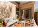 Cozy patio with comfortable seating, a decorative coffee table, and privacy walls at 21136 N 36Th Pl, Phoenix, AZ 85050