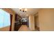 Spacious kitchen with dark cabinets and stainless steel appliances at 23771 W Yavapai St, Buckeye, AZ 85326