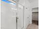 Shower with glass enclosure and tile floor at 2410 S 124Th Dr, Avondale, AZ 85323
