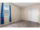 Bedroom with window and closet at 2410 S 124Th Dr, Avondale, AZ 85323