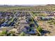 This aerial view showcases the home's location and backyard oasis, complete with a sparkling pool and desert landscaping at 25155 N 108Th Ave, Peoria, AZ 85383