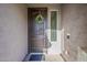 Welcome guests through this beautiful front door that features stylish accents, a charming wreath and 'No Soliciting' sign at 25155 N 108Th Ave, Peoria, AZ 85383
