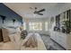 A beautifully decorated bedroom featuring modern furnishings and a soothing color palette at 25155 N 108Th Ave, Peoria, AZ 85383