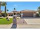 Charming single-story home with well-maintained landscaping, desert plants, and a two-car garage at 2984 N 152Nd Dr, Goodyear, AZ 85395