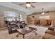 Inviting living room featuring an open floorplan with view to the kitchen at 2984 N 152Nd Dr, Goodyear, AZ 85395
