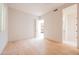 Bright, unfurnished bedroom with natural light, showcasing wood floors and neutral tones at 3153 E Sierra Vista Dr, Phoenix, AZ 85016