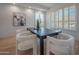 Bright dining room featuring modern furnishings and shutters at 3153 E Sierra Vista Dr, Phoenix, AZ 85016