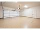 Clean, bright two-car garage with sealed flooring and modern fixtures for added convenience and functionality at 3153 E Sierra Vista Dr, Phoenix, AZ 85016