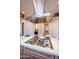 Modern kitchen island features a cooktop and ample counter space at 3153 E Sierra Vista Dr, Phoenix, AZ 85016