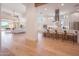 Open concept kitchen with large island, stainless steel hood, and views into the living area at 3153 E Sierra Vista Dr, Phoenix, AZ 85016