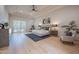 Bright main bedroom with tray ceiling, ceiling fan, and ensuite access at 3153 E Sierra Vista Dr, Phoenix, AZ 85016