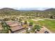 Aerial view of home in a neighborhood with a park, trails, and mountain views at 35402 N 32Nd Dr, Phoenix, AZ 85086