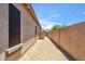 A backyard with fresh gravel and privacy block-wall fencing at 35402 N 32Nd Dr, Phoenix, AZ 85086